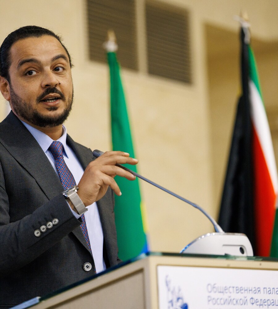 Government relations advisory — Mohamed Amer at an official government meeting